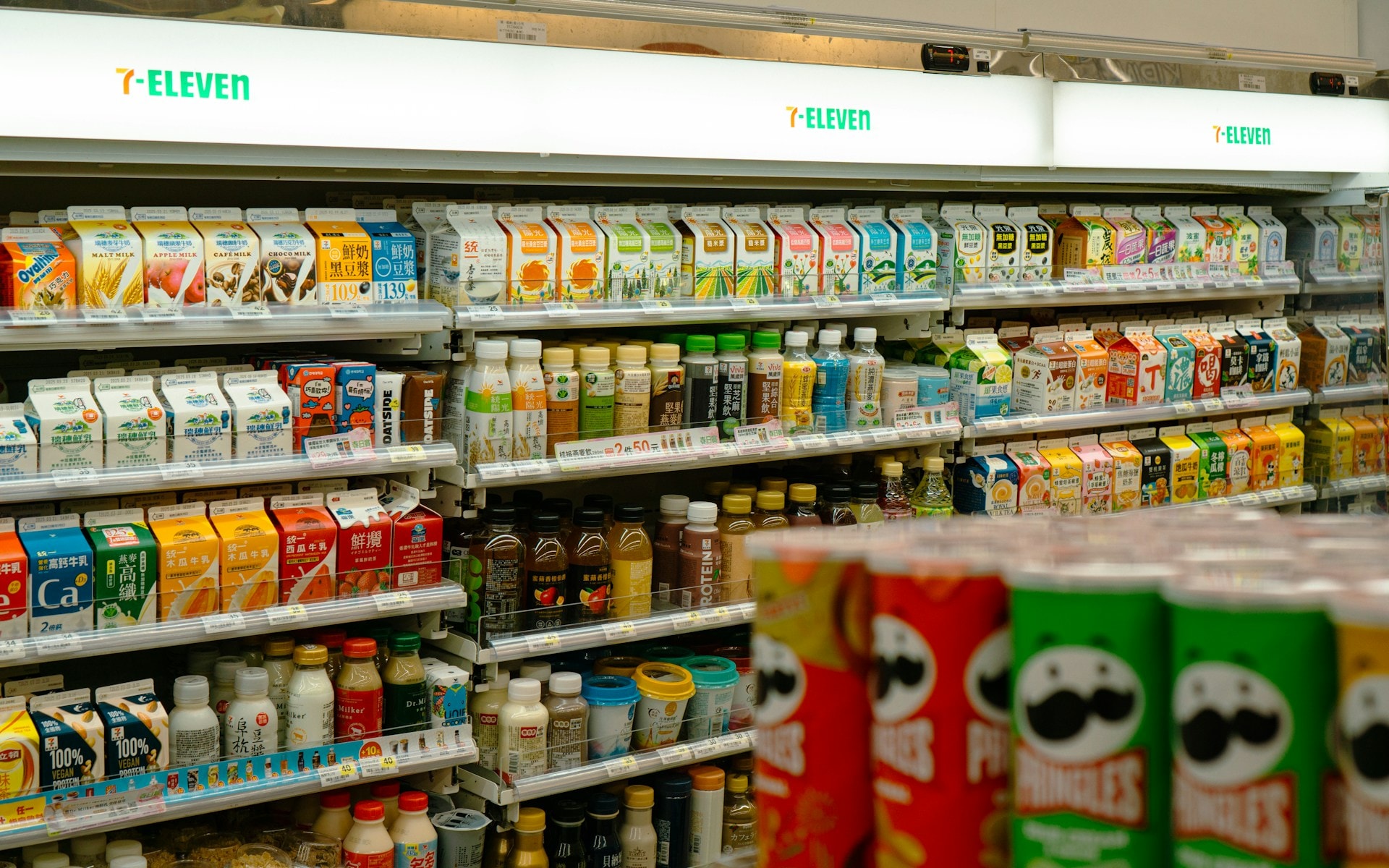 Packaged drinks and snacks on store shelves